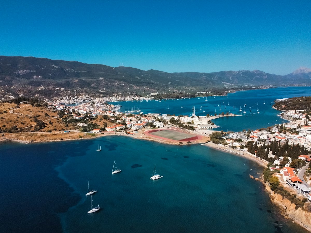 Sailing yachts at anchor off Poros